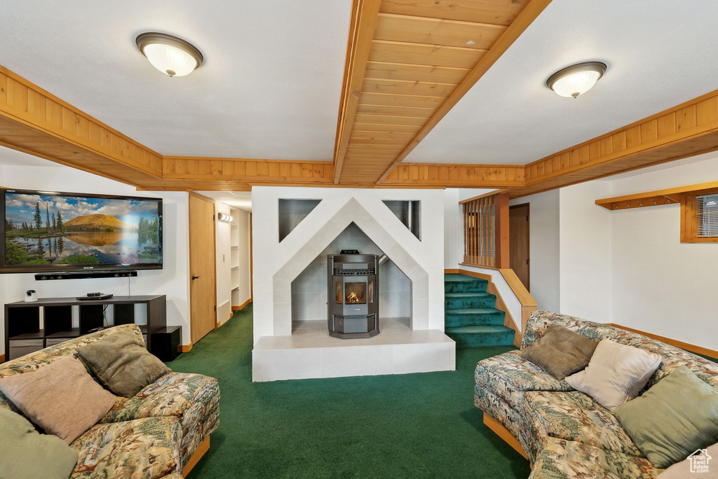 Living area with carpet floors and stairs