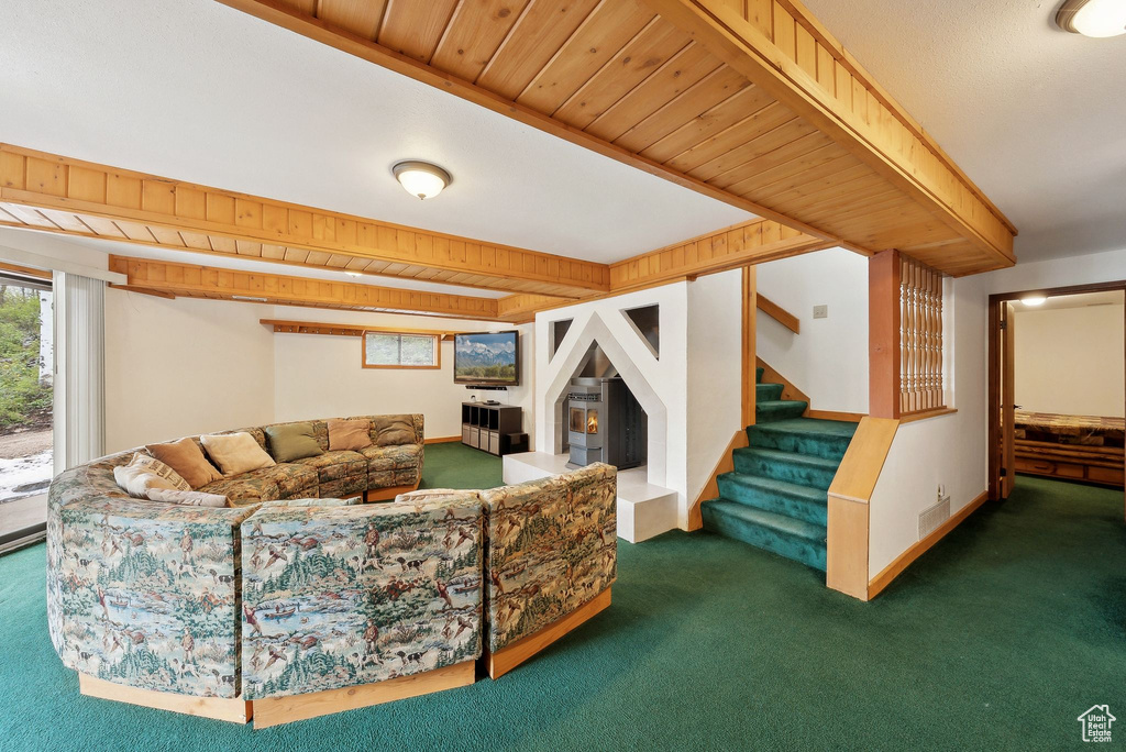 Living room featuring carpet flooring and stairway