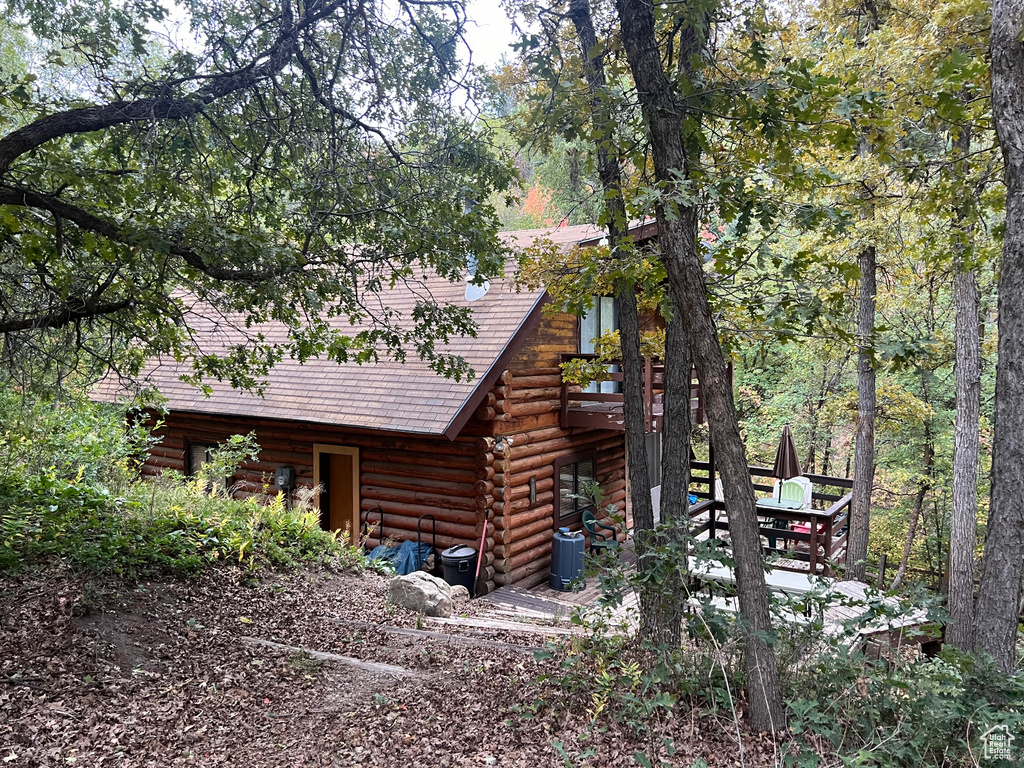 View of side of property with log exterior