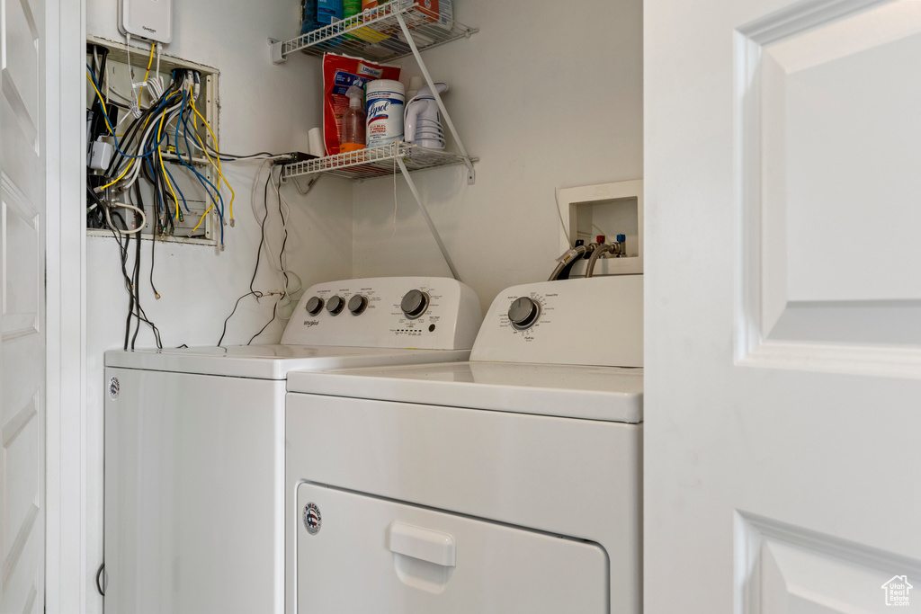 Washroom with washing machine and dryer