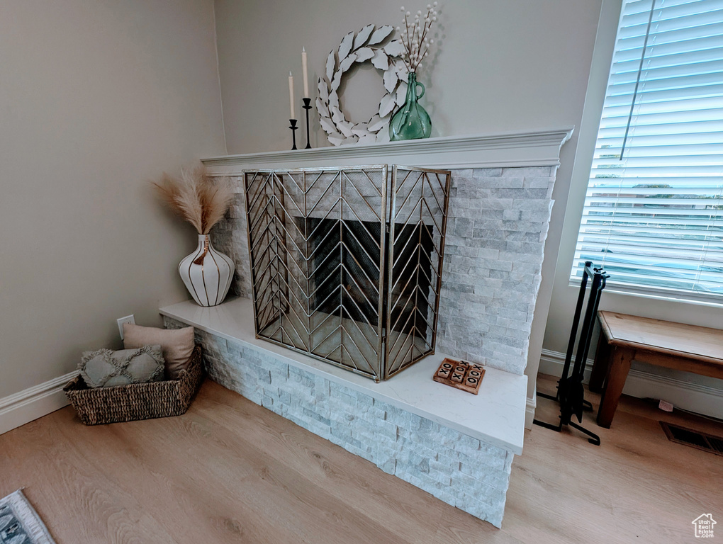 Detailed view of wood finished floors and baseboards