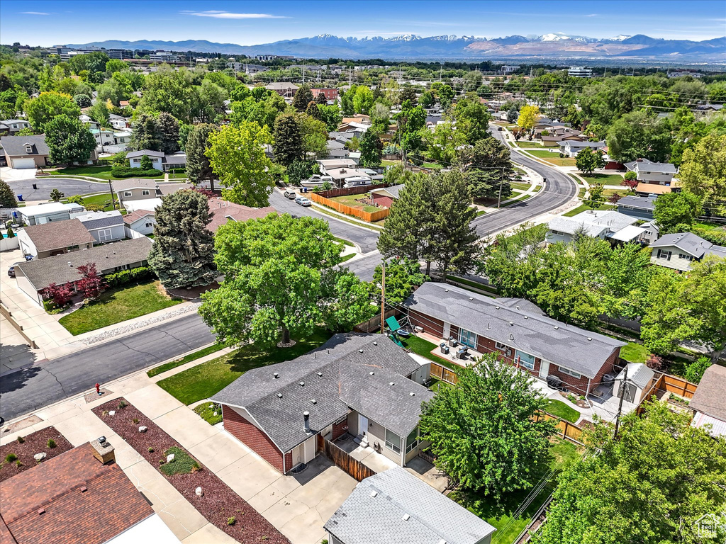 Aerial perspective of suburban area featuring mountains