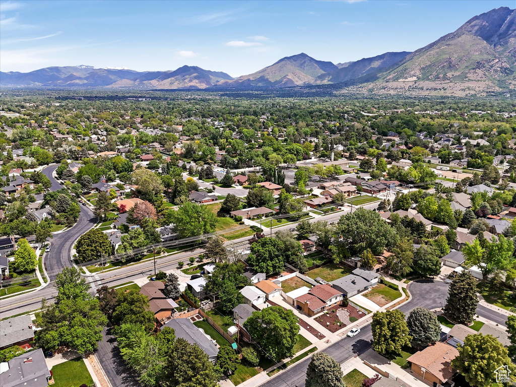 Aerial view of residential area with a mountainous background