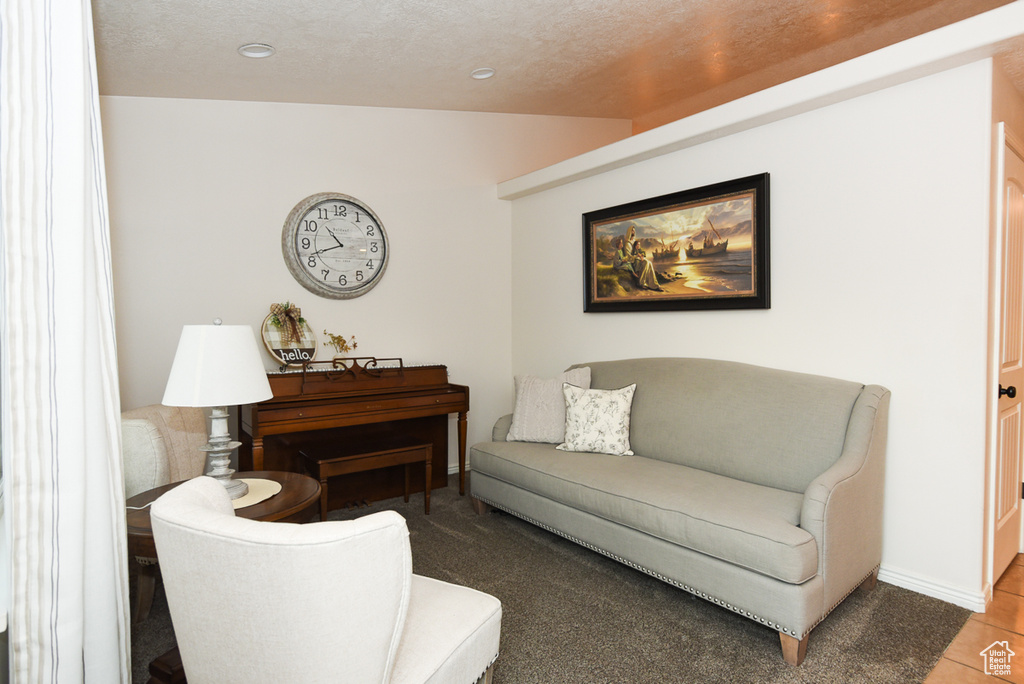 Living area featuring recessed lighting and baseboards