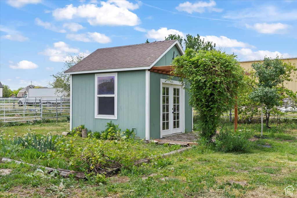 View of outbuilding with french doors