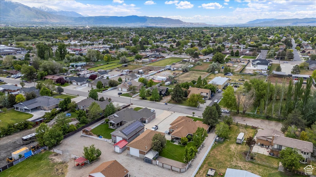 Aerial view of residential area with a mountain backdrop