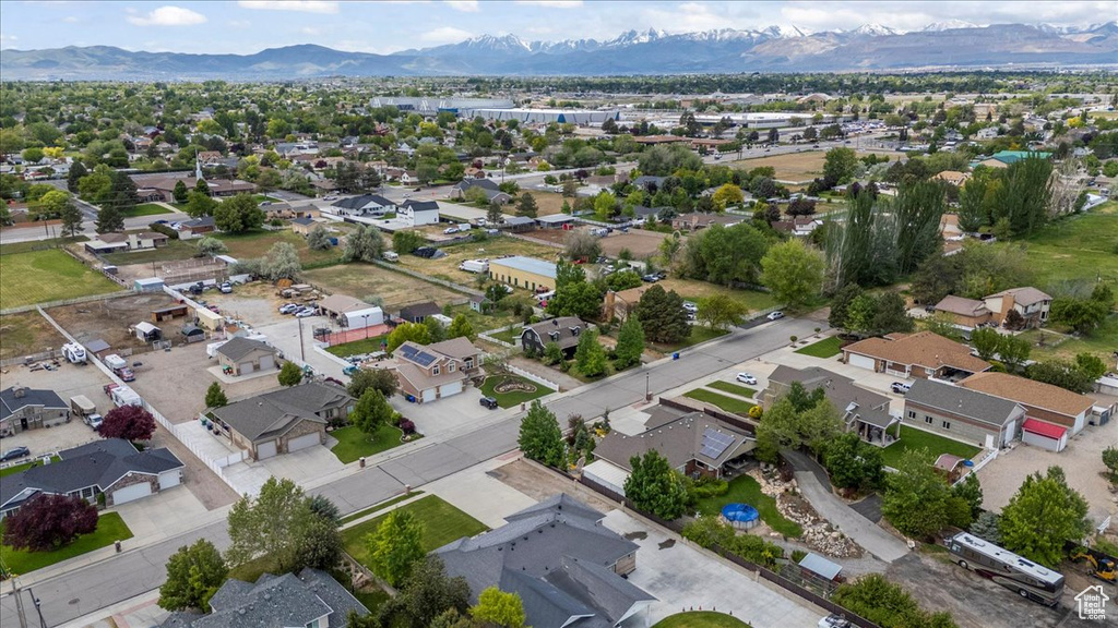Aerial view of residential area with a mountainous background