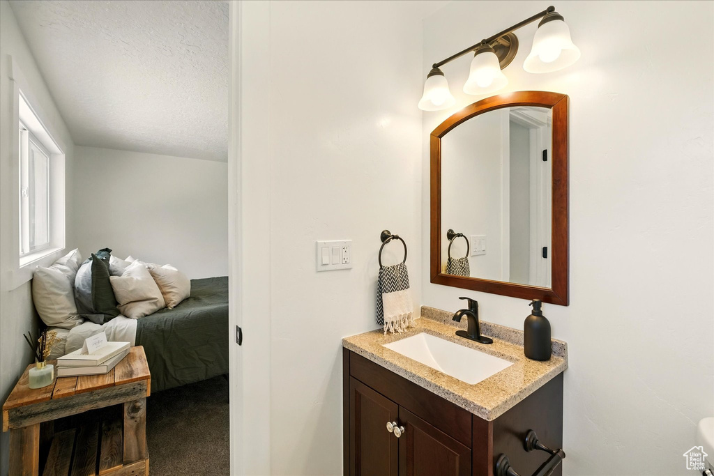 Bathroom featuring vanity