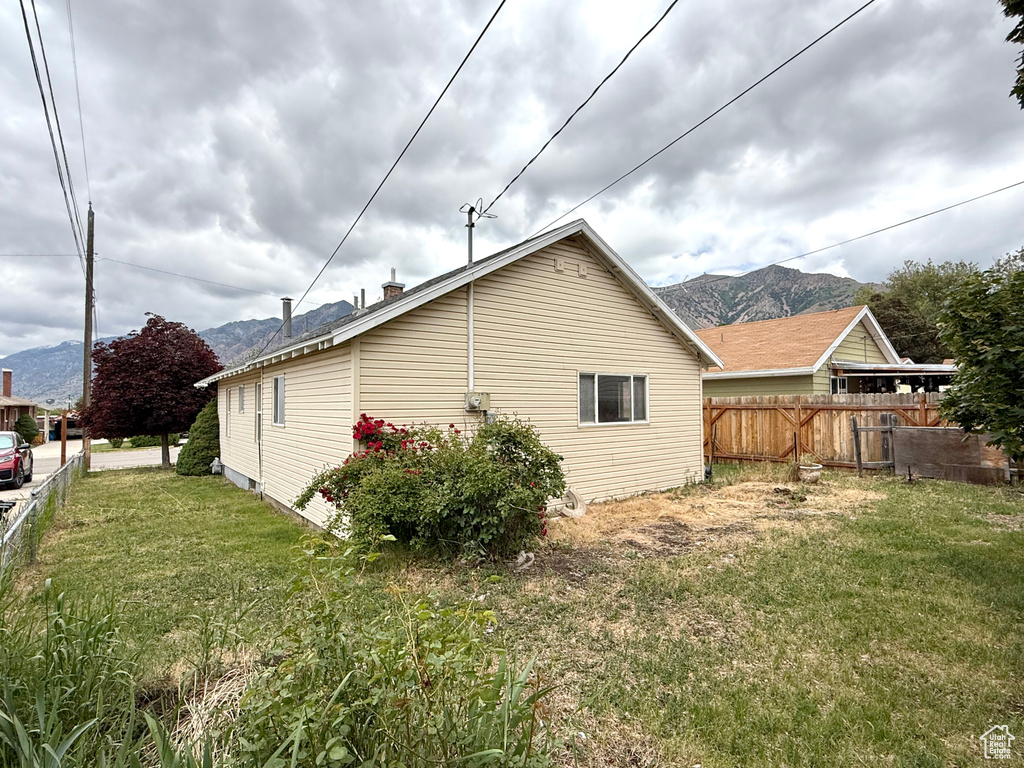 View of home's exterior with a mountain view
