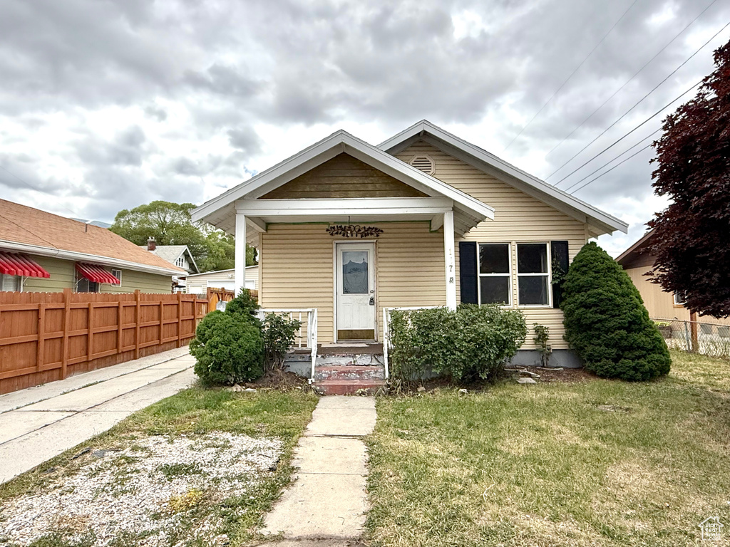 View of front of house with covered porch