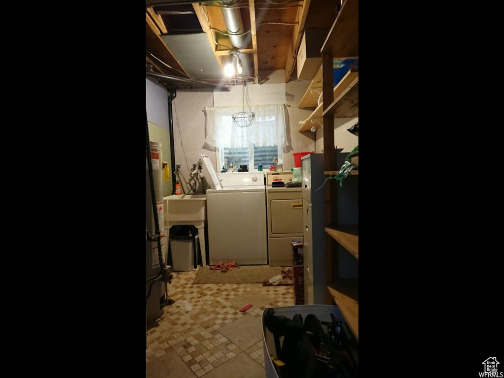 Below grade area with separate washer and dryer
