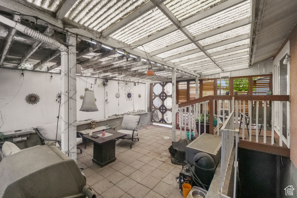 View of patio / terrace featuring an outdoor fire pit