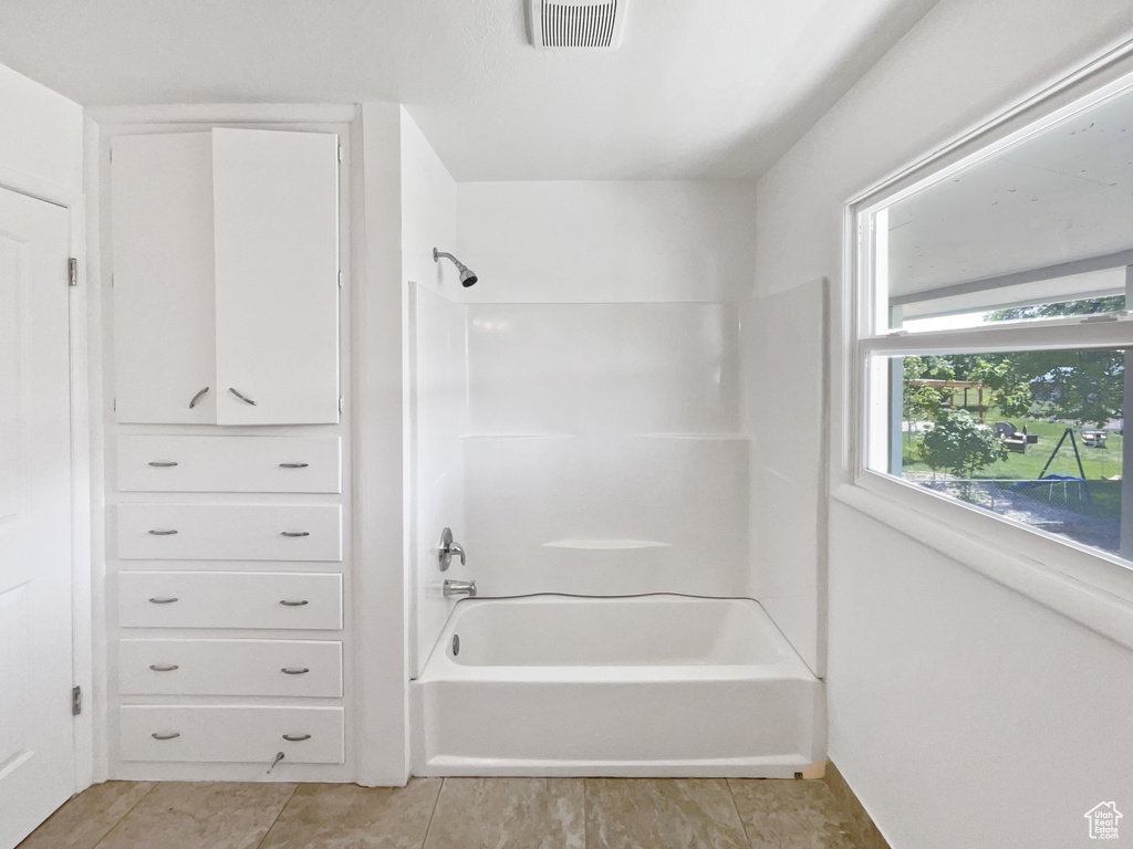 Bathroom featuring shower / tub combination