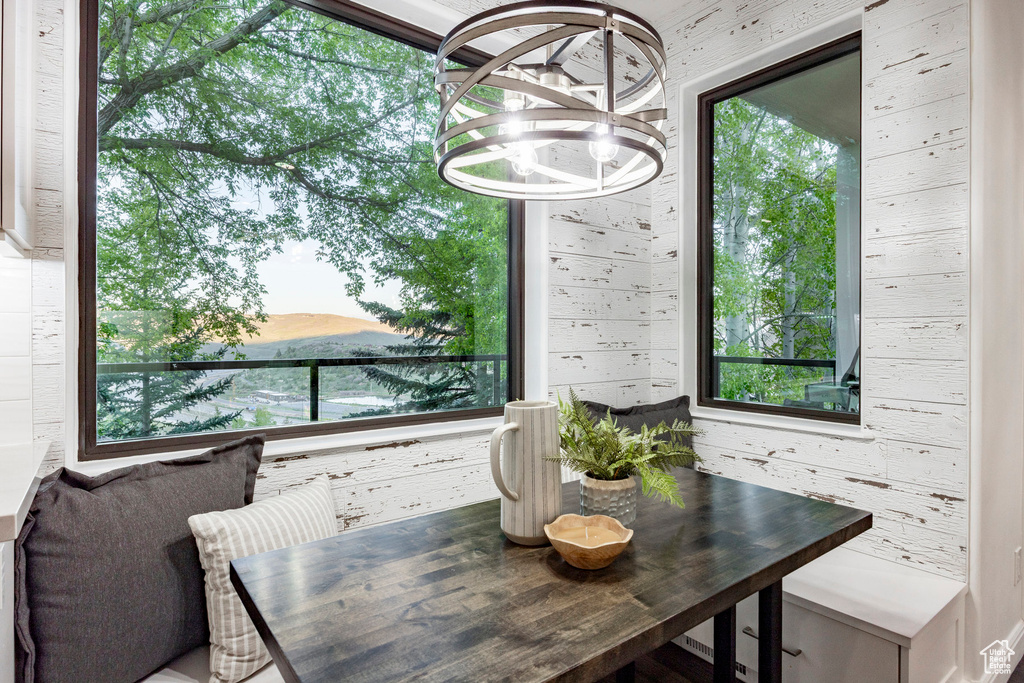 Dining area featuring a chandelier and plenty of natural light