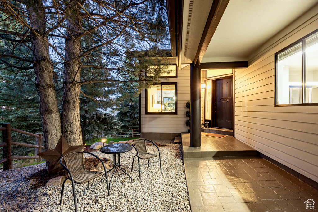 Property entrance featuring a patio area