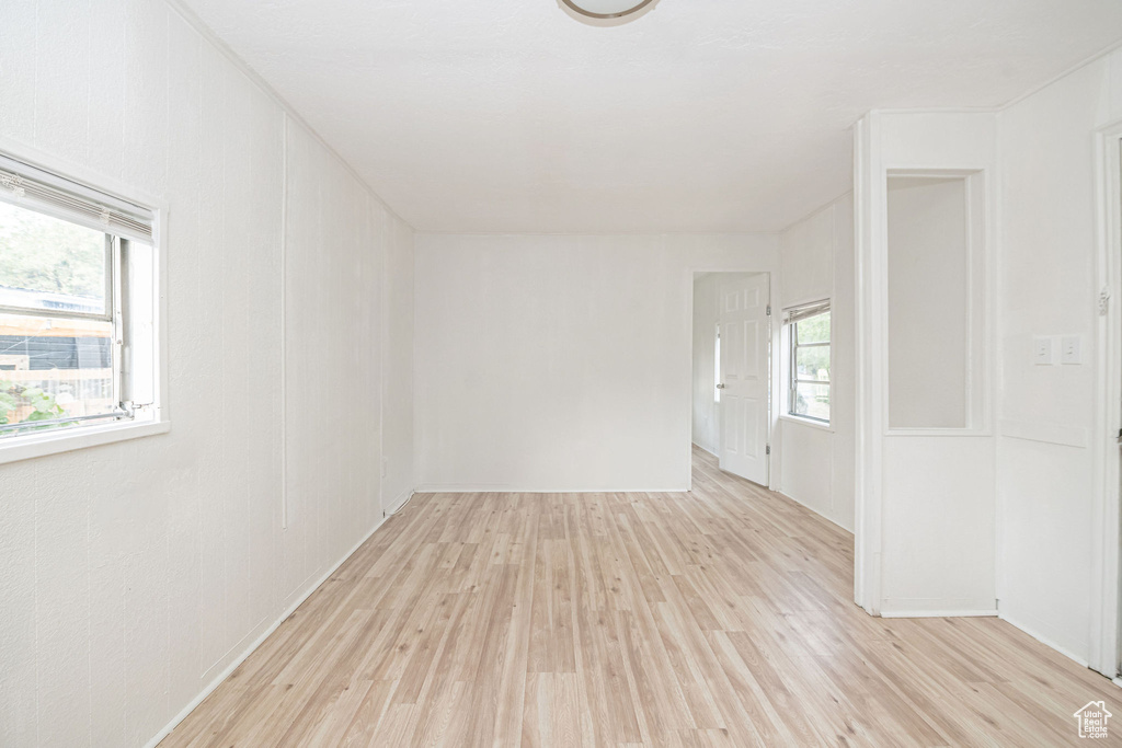 Unfurnished room featuring light wood finished floors