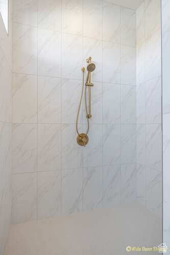 Bathroom view of tiled shower