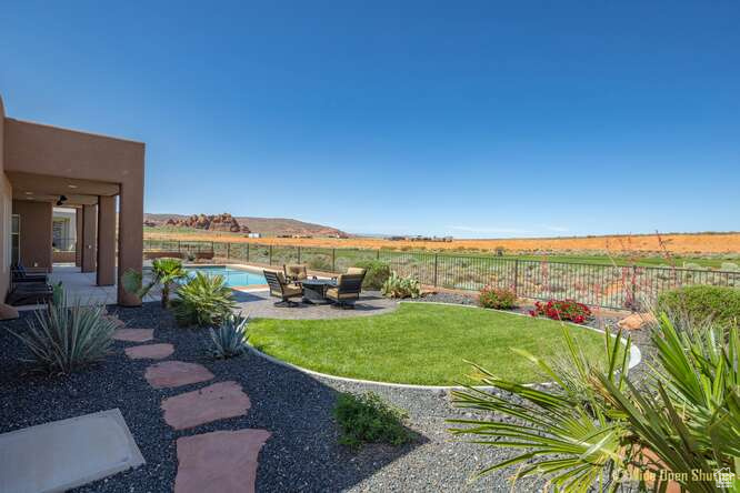 View of yard featuring a patio and a view of rural / pastoral area