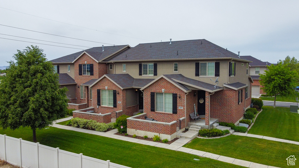 View of front of home with brick siding