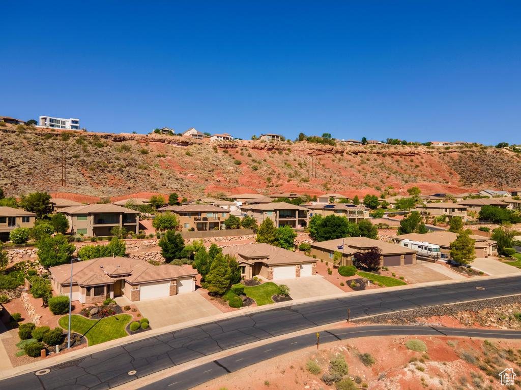 View of mountain background featuring nearby suburban area