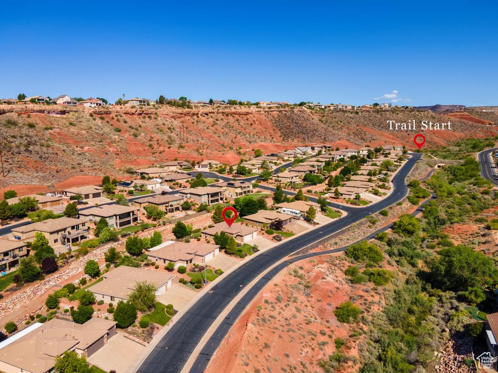 Aerial view of property's location with nearby suburban area