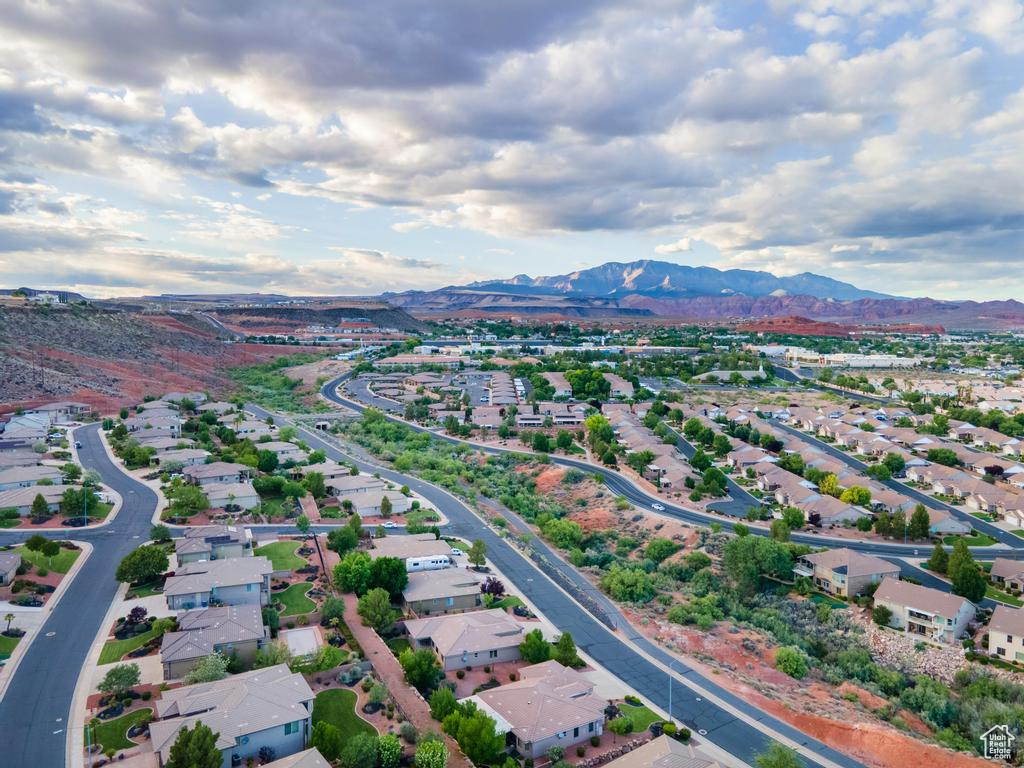 View of property location with a mountainous background and nearby suburban area