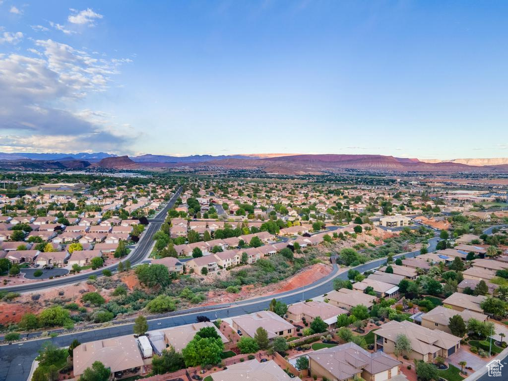 Aerial view of residential area with a mountainous background