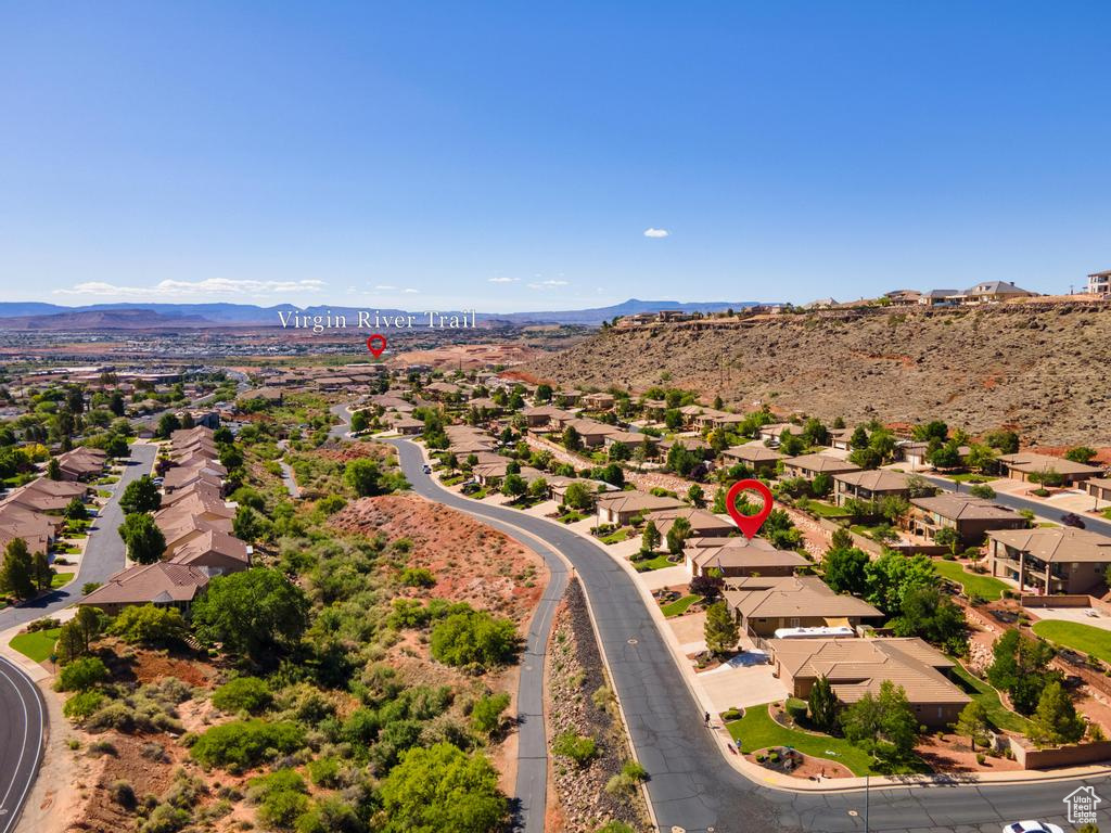 Aerial view of residential area featuring mountains