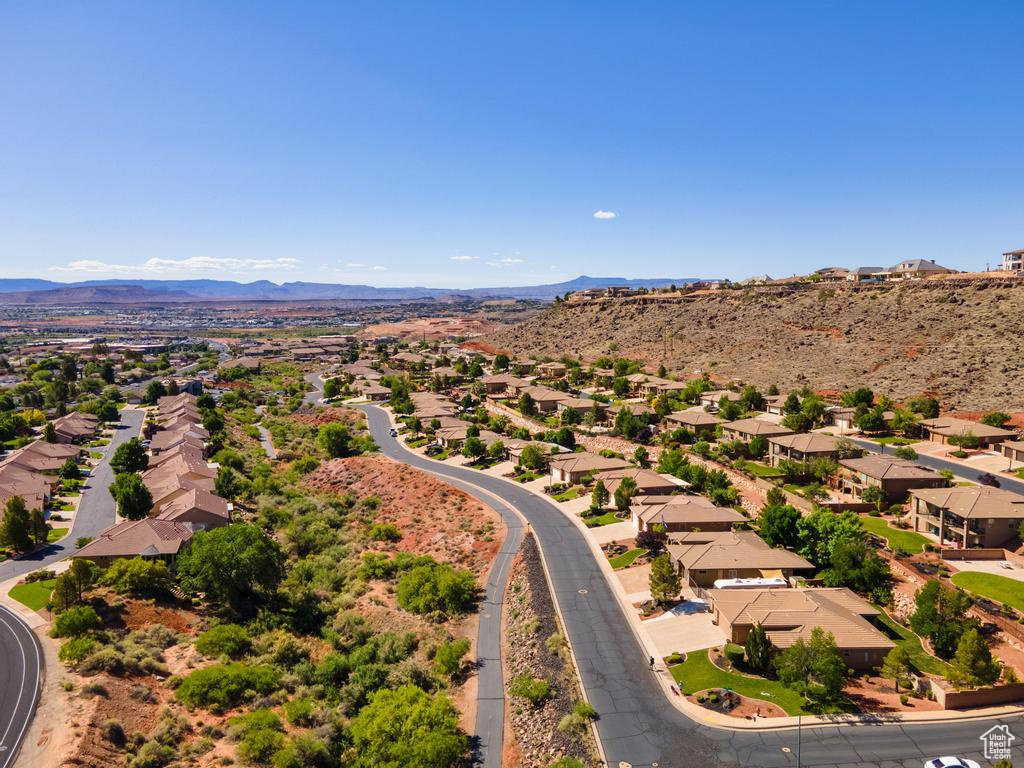 Aerial view of residential area with a mountain backdrop