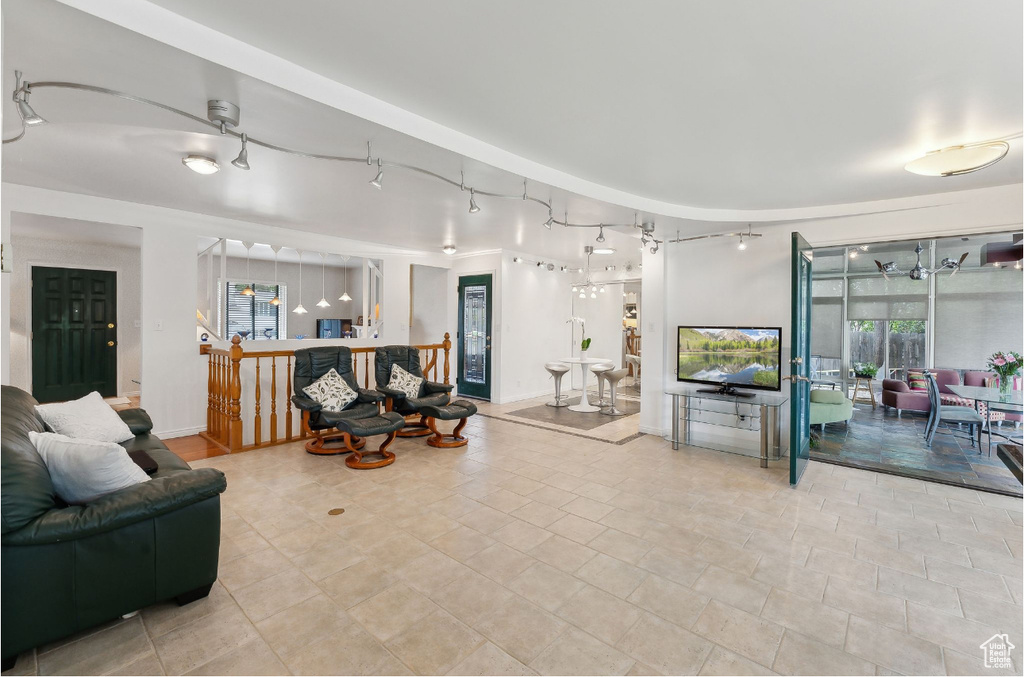 Living area featuring baseboards