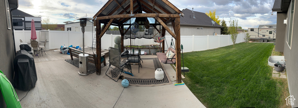 Exterior space with a patio area and a gazebo