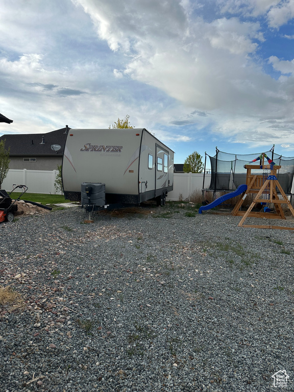 View of shed / structure with a playground
