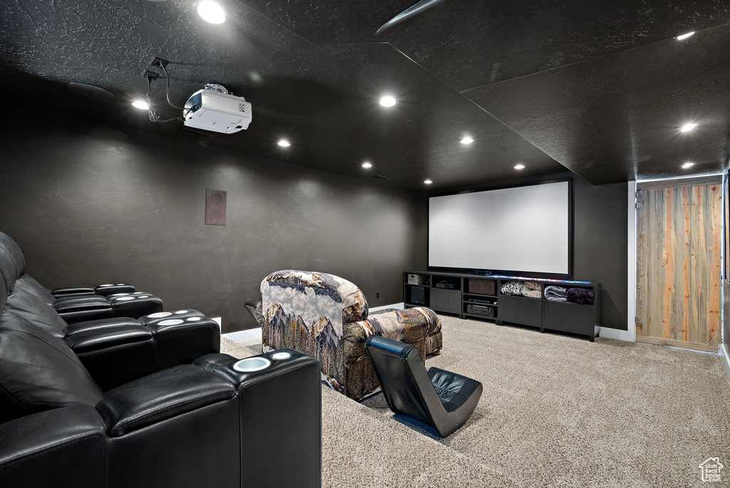 Cinema with carpet floors, baseboards, and recessed lighting