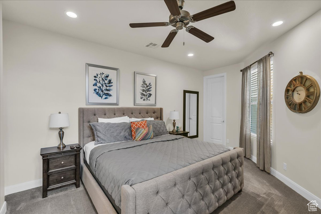 Bedroom with carpet, baseboards, recessed lighting, and ceiling fan