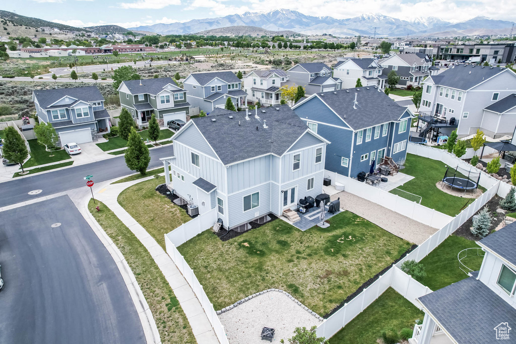 Aerial perspective of suburban area featuring mountains