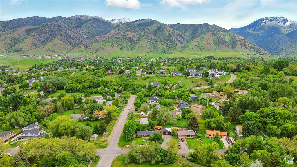 View of mountain background featuring nearby suburban area