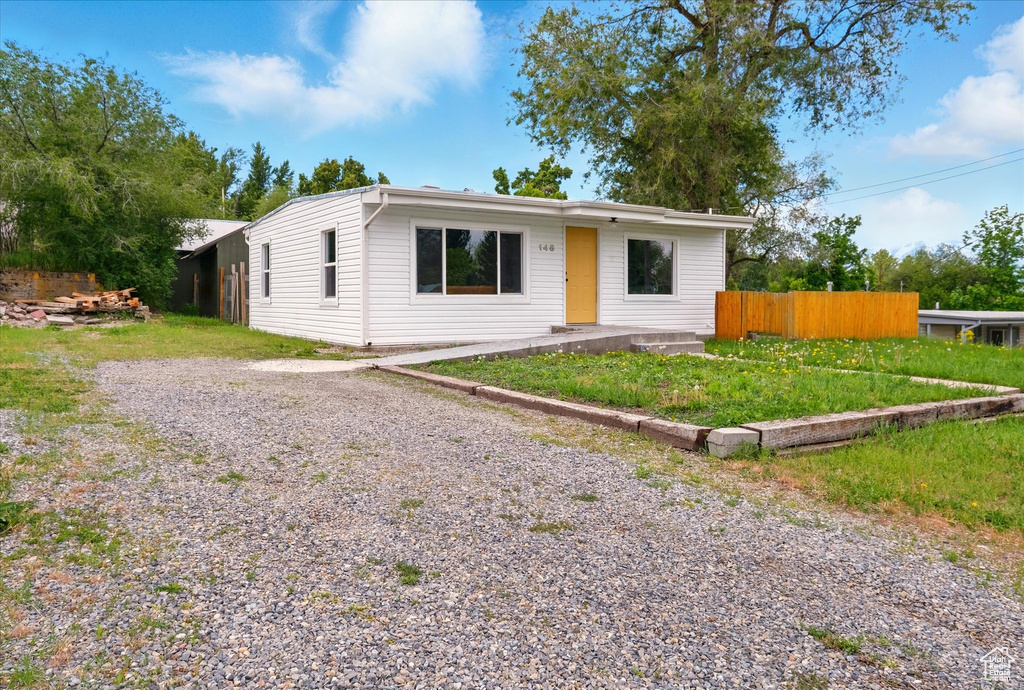 View of front of property featuring a patio area