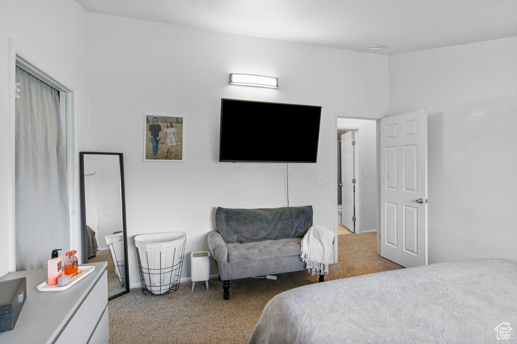 Carpeted bedroom with baseboards