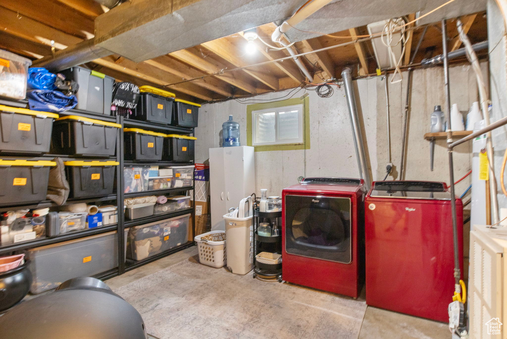 Unfinished below grade area with separate washer and dryer