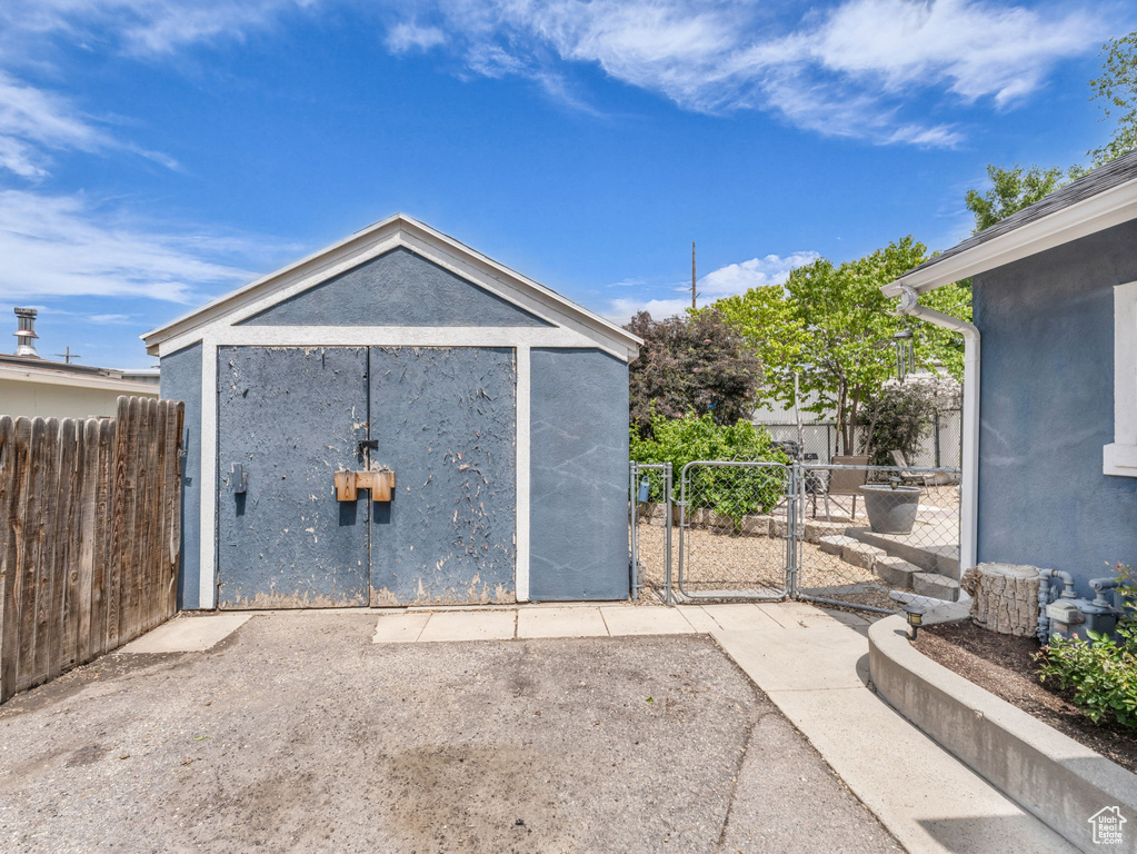 View of shed with a gate