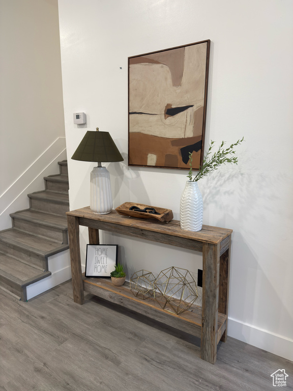 Detailed view of wood finished floors and baseboards