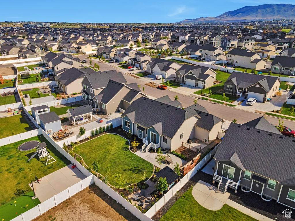 Aerial perspective of suburban area featuring mountains