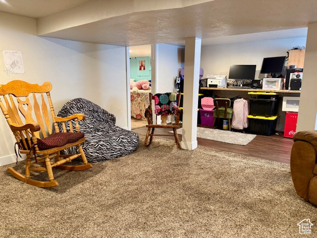 Living area with wood finished floors