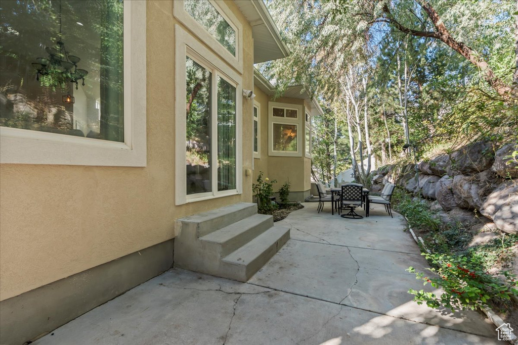 View of patio with outdoor dining area