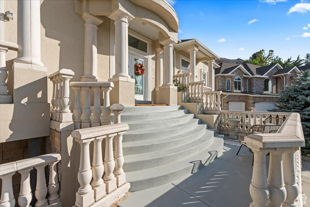 Covered porch with a residential view