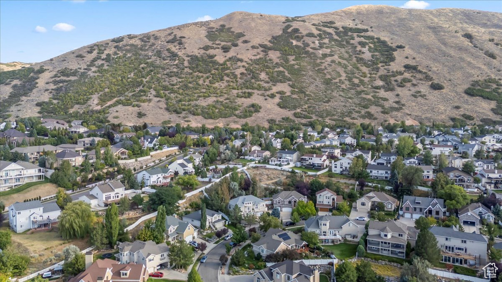 Aerial view of residential area with a mountain backdrop
