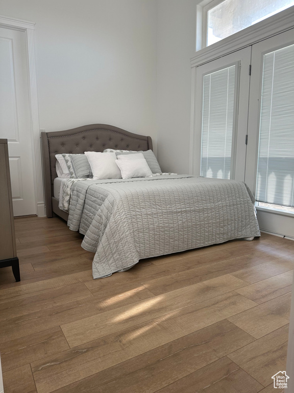 Bedroom with wood finished floors