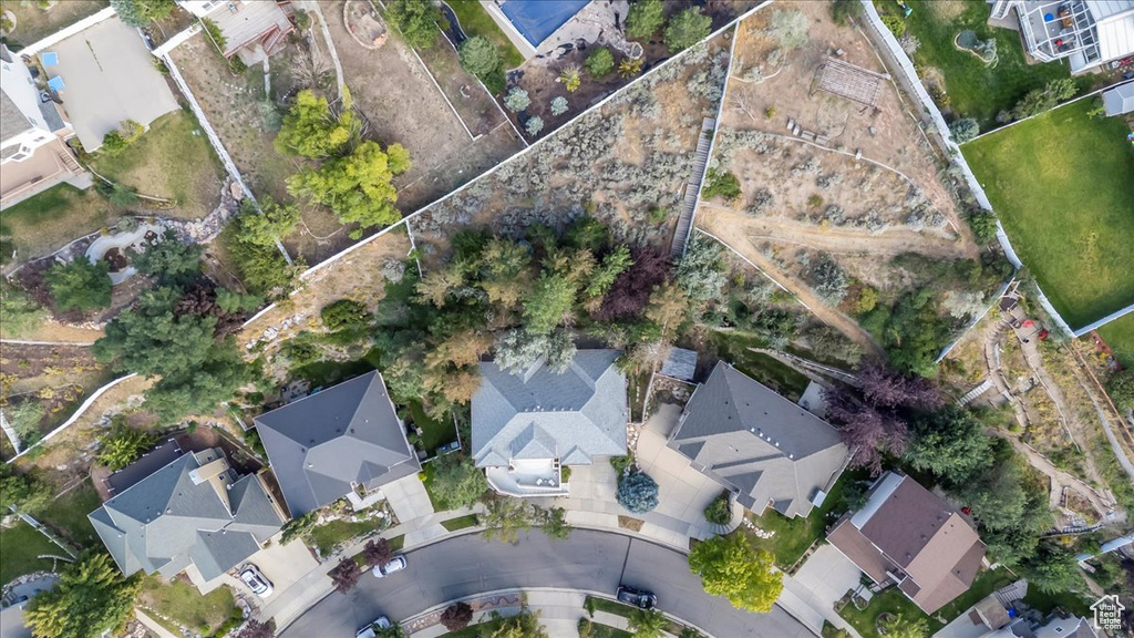 Aerial overview of property's location with nearby suburban area