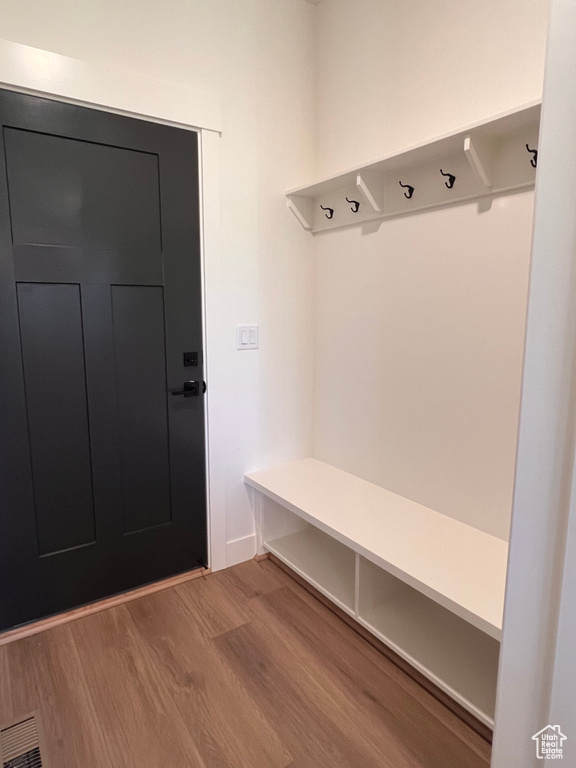 Mudroom featuring wood finished floors