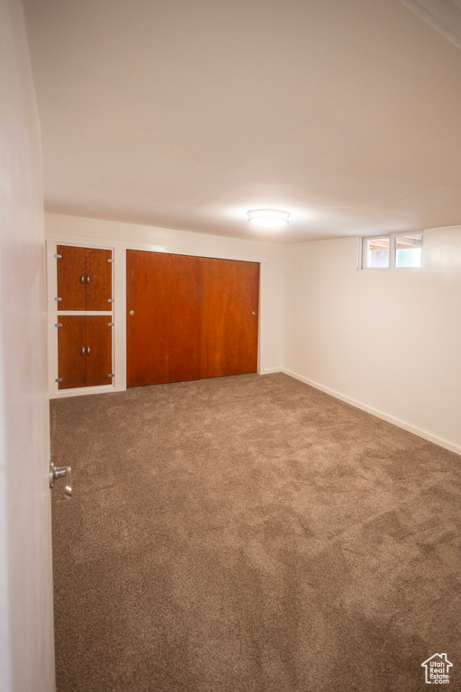 Spare room with carpet floors